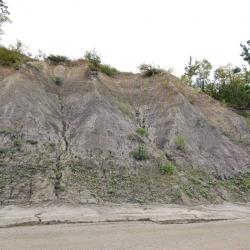 rocky outcrop on the side of a road