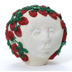 E2014.24  "Strawberry Moon" by Tammy Tarbell-Boehning (Mohawk)   Raised glass beadwork on clay