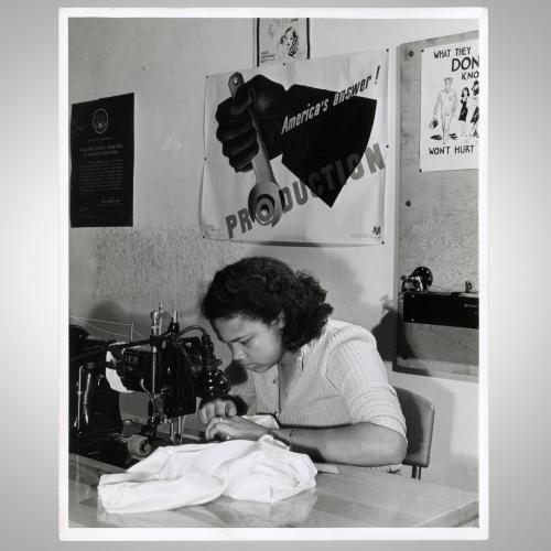 Photograph of woman sewing parachutes, United States Office of War Information, 1943