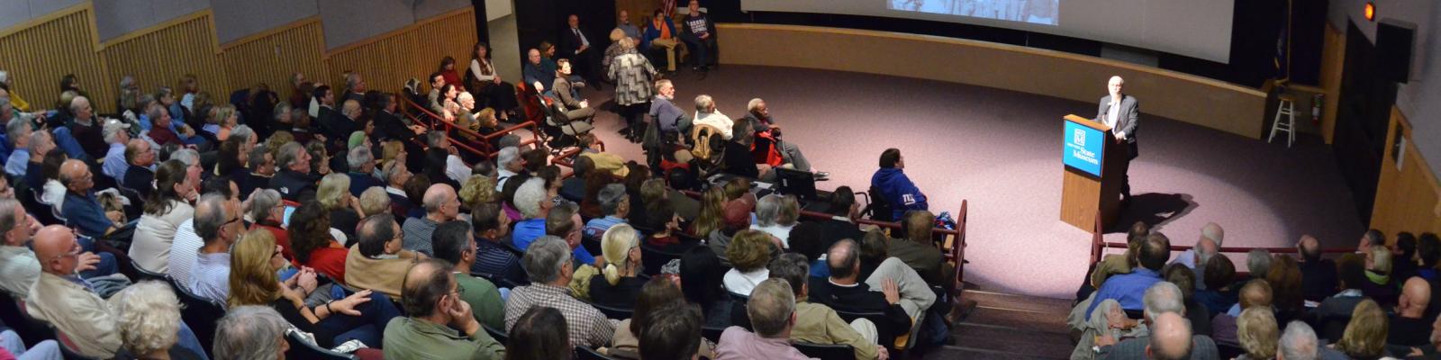 people gathered in the Huxely theater. 